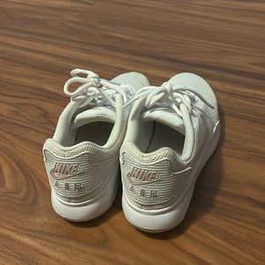 Pink and White Nike Air’s size 8